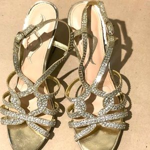 Nina Wedge gold Sandler size 8.